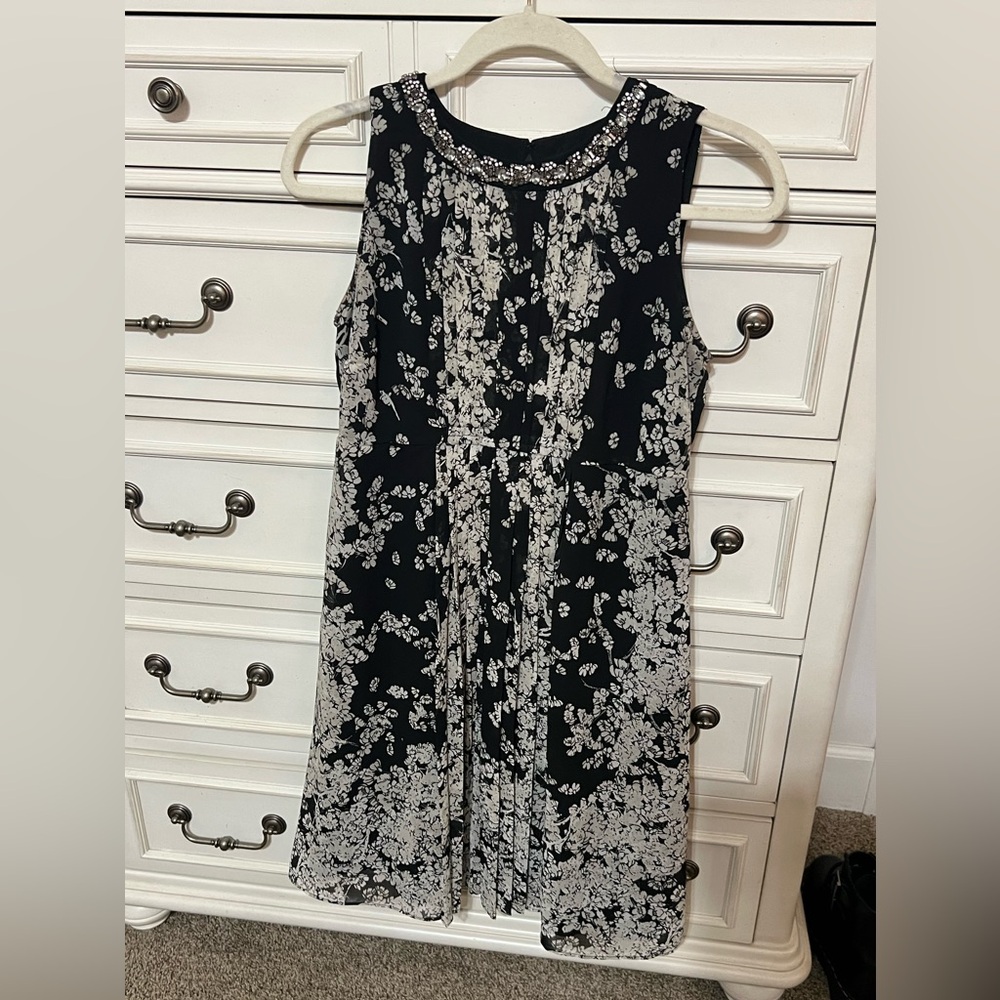 Black and white floral maternity dress with jeweled neckline